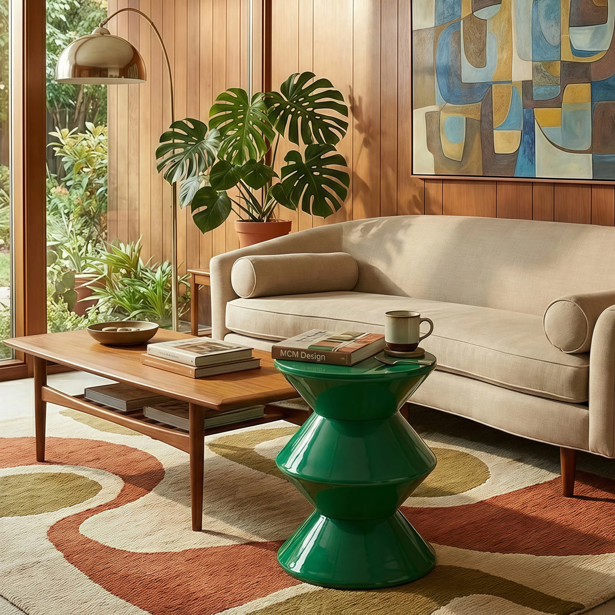 Table d'appoint sablier verte à côté d'un canapé